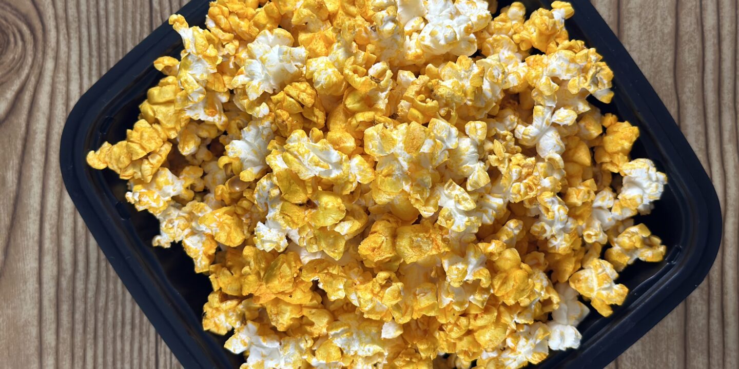 A bowl of popcorn being eaten as part of a healthy weight loss plan